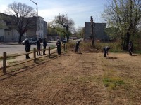 The first stage of the greening effort was to clear the lots and have inmates construct fencing around each.